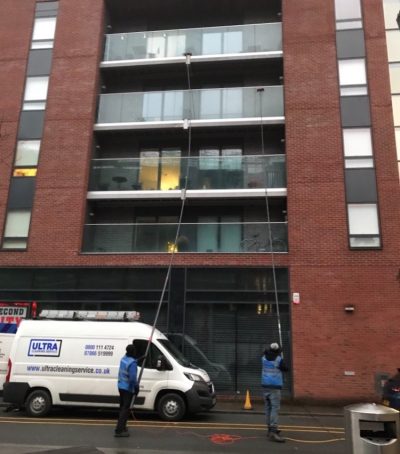 UCS Latest tech high reach Ultra Cleaning Service staff using the latest extended reach cleaning solutions.