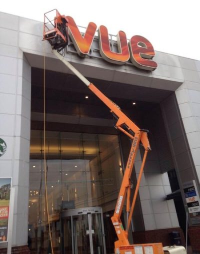 UCS sign cleaning Picture of high level external sign and banner cleaning - introducing Ultra Cleaning Service's Banner Installation and Banner Cleaning services