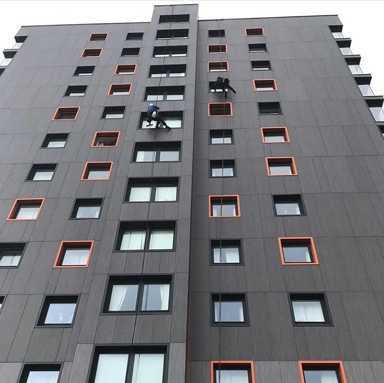 UCSIMG_2922.jpg Apartment block with abseiling window cleaners working near the top.